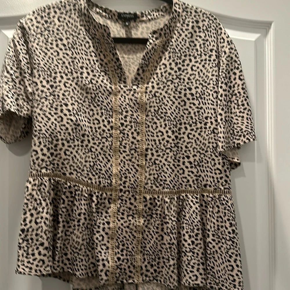 Beautiful Express 100% Rayon animal print top dry cleaned